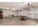 Spacious garage with a workbench and storage cabinets at 1785 S Nebraska St, Chandler, AZ 85286