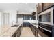 Modern kitchen with stainless steel appliances and granite countertops at 25952 S 224Th Pl, Queen Creek, AZ 85142