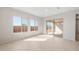 Bright Gathering room with sliding door access to backyard at 25952 S 224Th Pl, Queen Creek, AZ 85142