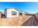 New construction home with a large backyard and block wall at 25952 S 224Th Pl, Queen Creek, AZ 85142