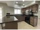 Kitchen with granite countertops and stainless steel appliances at 15008 N 48Th Pl, Scottsdale, AZ 85254