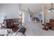 Spacious living room with high ceilings and comfortable seating at 13047 W Peach Blossom Dr, Sun City West, AZ 85375