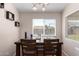 Small dining area with table and chairs, near kitchen at 6837 W Ironwood Dr, Peoria, AZ 85345