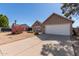 House exterior with landscaping and driveway at 6837 W Ironwood Dr, Peoria, AZ 85345