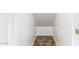 Small storage room with tiled floor, ideal for extra storage needs at 18774 N Ibis Way, Maricopa, AZ 85138