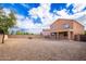 Two-story house with covered patio and a spacious backyard at 18774 N Ibis Way, Maricopa, AZ 85138