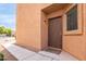 Inviting home exterior with a walkway leading to the front door at 18774 N Ibis Way, Maricopa, AZ 85138
