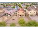 Aerial view of house and surrounding homes, showing the neighborhood context at 18774 N Ibis Way, Maricopa, AZ 85138