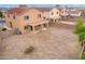 Backyard view of house with gravel and block wall at 18774 N Ibis Way, Maricopa, AZ 85138