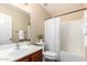 Clean bathroom with single vanity, tub, and shower at 18774 N Ibis Way, Maricopa, AZ 85138