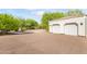 Two-car garage with large driveway and mature landscaping at 5330 N Palo Cristi Rd, Paradise Valley, AZ 85253