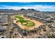 Community overview featuring a golf course and mountain views at 25979 W Taro Dr, Buckeye, AZ 85396