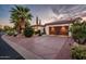 Single-story home with Spanish-style architecture and desert landscaping at 23228 N Gaviota Dr, Sun City West, AZ 85375