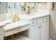 Double bathroom vanity with quartz countertop and modern fixtures at 23228 N Gaviota Dr, Sun City West, AZ 85375