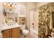Clean bathroom with shower/tub combo, toilet and vanity at 23228 N Gaviota Dr, Sun City West, AZ 85375