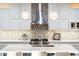 Bright kitchen features stainless steel appliances and stylish backsplash at 23228 N Gaviota Dr, Sun City West, AZ 85375