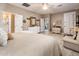 Spacious main bedroom with king-size bed and en-suite bath at 23228 N Gaviota Dr, Sun City West, AZ 85375