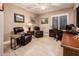 Relaxing office space with two leather recliners and a wood desk at 23228 N Gaviota Dr, Sun City West, AZ 85375