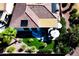 Aerial view showcasing backyard patio and landscaping at 23228 N Gaviota Dr, Sun City West, AZ 85375