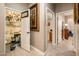 Well-stocked wet bar with various liquor bottles and glassware at 23228 N Gaviota Dr, Sun City West, AZ 85375