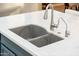 Modern double kitchen sink with a sleek faucet and water filter at 23228 N Gaviota Dr, Sun City West, AZ 85375