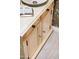 Elegant bathroom vanity with antique-style cabinet and vessel sink at 23228 N Gaviota Dr, Sun City West, AZ 85375