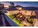 Private courtyard with seating area and fire pit at 23228 N Gaviota Dr, Sun City West, AZ 85375