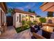 Inviting patio area featuring a fire pit and comfortable seating at 23228 N Gaviota Dr, Sun City West, AZ 85375