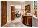 Bright entryway with wood console table, view into dining room at 23228 N Gaviota Dr, Sun City West, AZ 85375