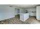 Modern kitchen with white cabinets and a large island at 3823 W Augusta Ave, Phoenix, AZ 85051