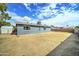 House exterior and large backyard with gravel at 3823 W Augusta Ave, Phoenix, AZ 85051