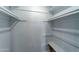 Simple closet with double rods and a bottom shelf at 3823 W Augusta Ave, Phoenix, AZ 85051