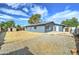 House exterior and backyard with gravel and shed at 3823 W Augusta Ave, Phoenix, AZ 85051