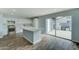 Modern kitchen with white cabinets, marble backsplash, and stainless steel appliances at 3823 W Augusta Ave, Phoenix, AZ 85051
