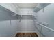 Well-organized closet with shelves and hanging rod at 3823 W Augusta Ave, Phoenix, AZ 85051
