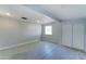 Unfinished garage with single door and window at 3823 W Augusta Ave, Phoenix, AZ 85051