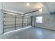 Spacious garage with automatic opener and extra storage space at 3823 W Augusta Ave, Phoenix, AZ 85051