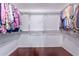 Spacious walk-in closet with ample shelving and hanging space at 6337 W Irma Ln, Glendale, AZ 85308