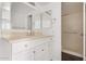 Bathroom with white vanity, large mirror, and shower at 1920 W Lindner Ave # 137, Mesa, AZ 85202