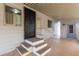Back patio with steps and access to the home at 205 S Higley Rd # 288, Mesa, AZ 85206