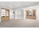 Living room with built-in shelving and a ceiling fan at 205 S Higley Rd # 288, Mesa, AZ 85206