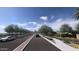 Landscaped community road with sidewalks and parked cars at 9986 W Cora W Ln, Avondale, AZ 85392