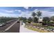 Attractive community entrance with landscaping and signage at 9986 W Cora W Ln, Avondale, AZ 85392