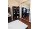 Home office with large desk and mirrored closet at 4450 S Rio Dr, Chandler, AZ 85249