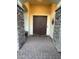 Elegant entryway with double doors and stone accents at 4450 S Rio Dr, Chandler, AZ 85249
