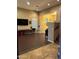 Game room with shuffleboard table, large TV and tiled floor at 4450 S Rio Dr, Chandler, AZ 85249