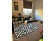 Playroom with colorful rug, storage, and comfortable seating at 4450 S Rio Dr, Chandler, AZ 85249