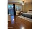 Main bedroom with hardwood floors and access to balcony at 4450 S Rio Dr, Chandler, AZ 85249