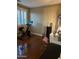 Bright bedroom with Peloton bike and wood floors at 4450 S Rio Dr, Chandler, AZ 85249