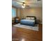 Spacious main bedroom with hardwood floors and ample natural light at 4450 S Rio Dr, Chandler, AZ 85249
